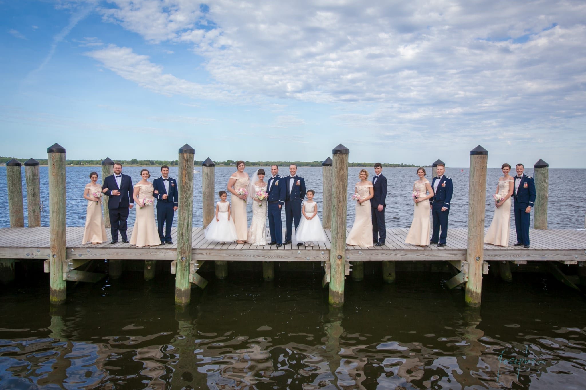 Bridal Party and Bride and Groom on Dock Far Away Shot