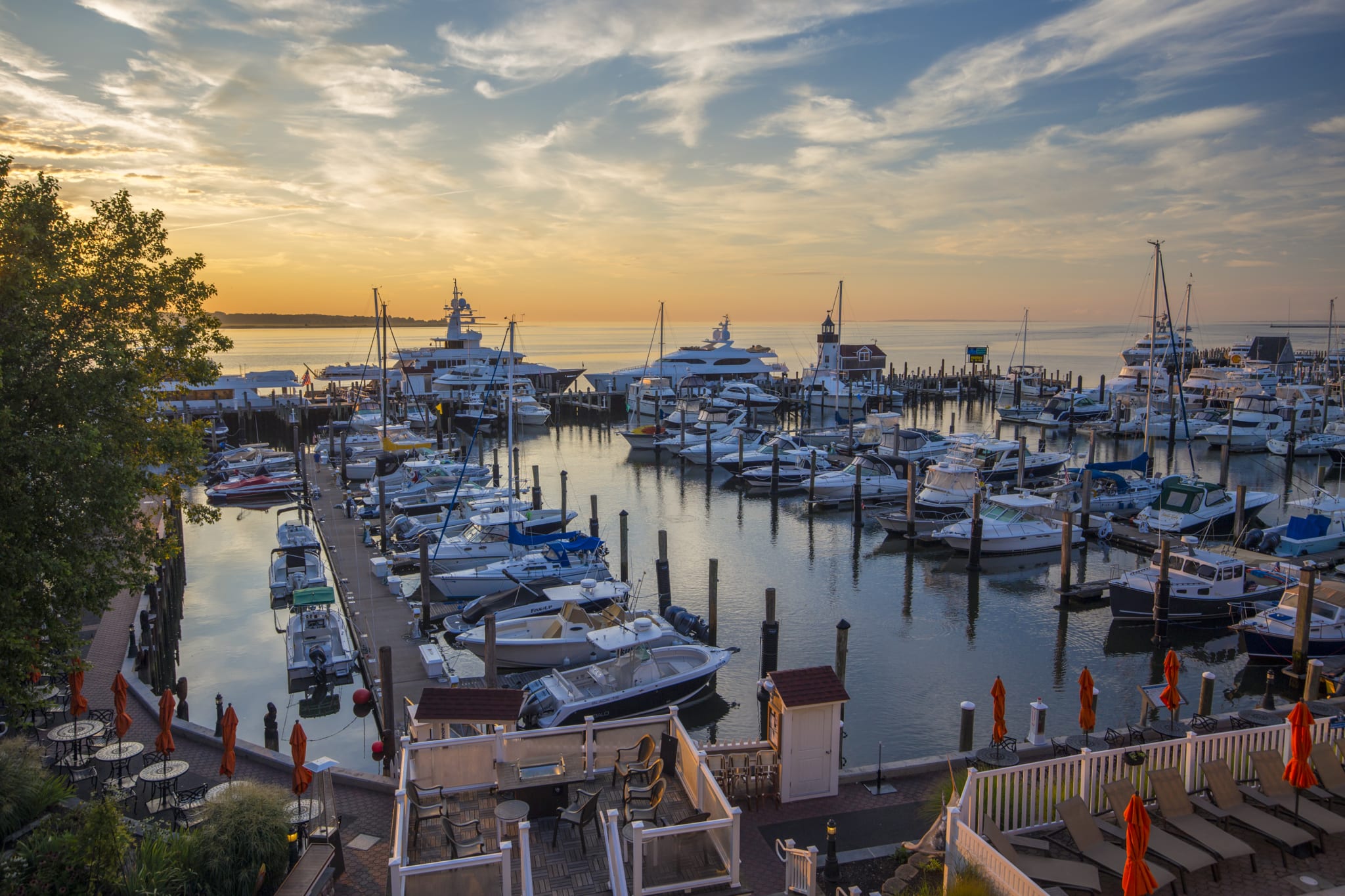 Sunrise over a marina full of boats