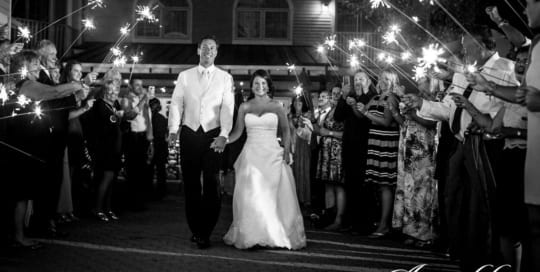 Bride and groom walking out of wedding.