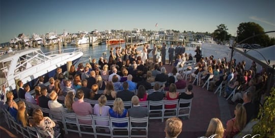 Wedding ceremony near a harbor.