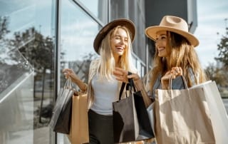 Two girls shop at the outlets near Saybrook Resort.